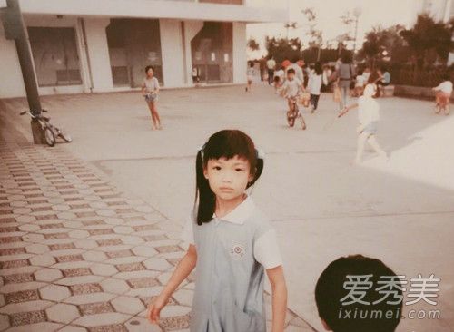 容祖儿晒童年照是怎么回事 容祖儿晒童年照是什么样子的